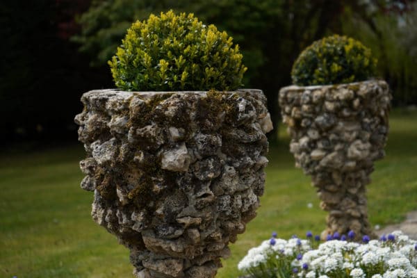 Pair of Grotto urns