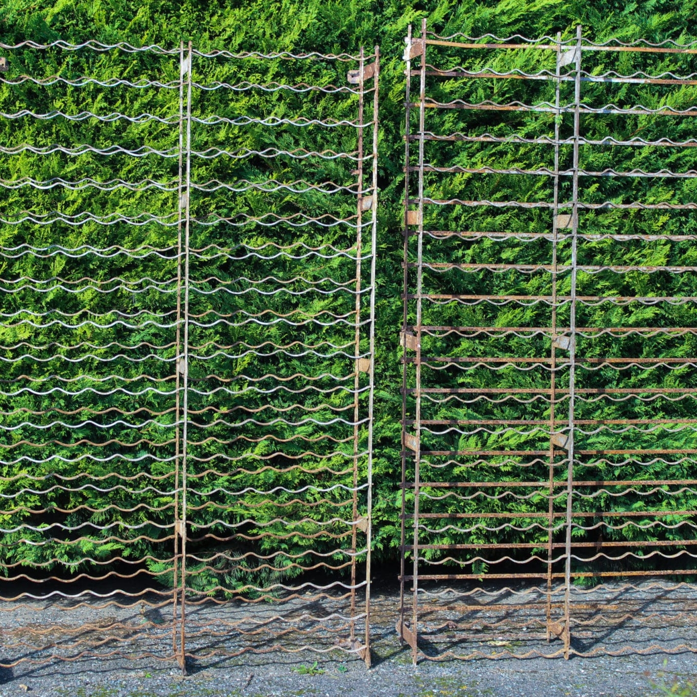Two similar 19th century antique wrought iron wine racks