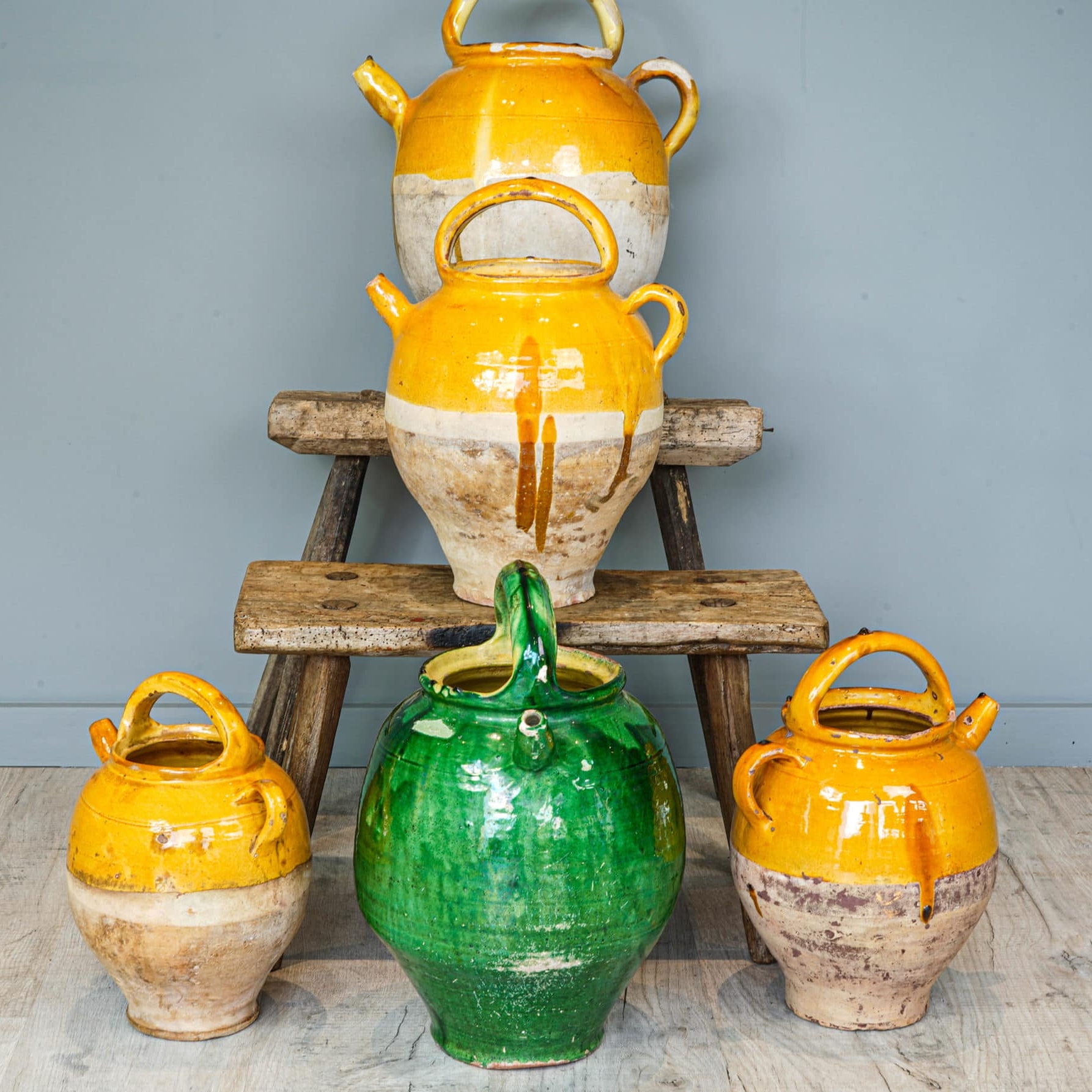 cruche pots of varying sizes antique