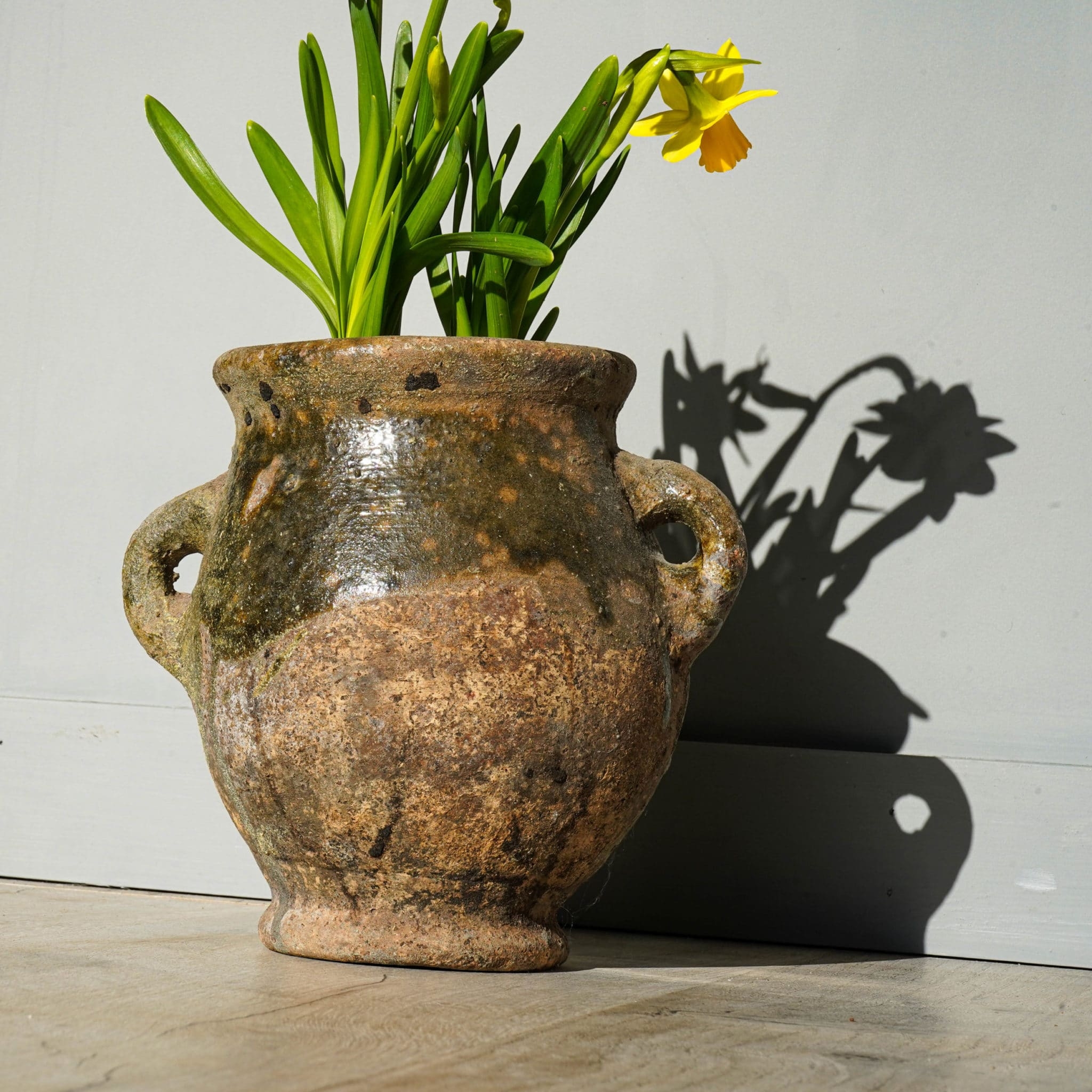 an antique spanish pot