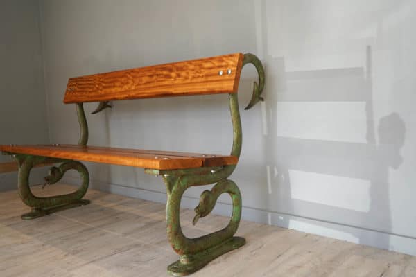 an antique cast iron bench