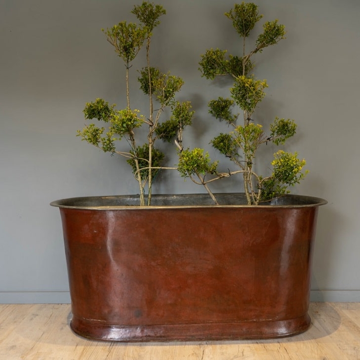 an antique copper bath