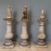 antique animals on pedestals for the garden