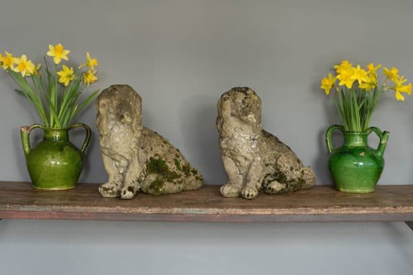 antique reconstituted garden dog statue