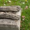 pair of recumbant garden cast stone dog statues