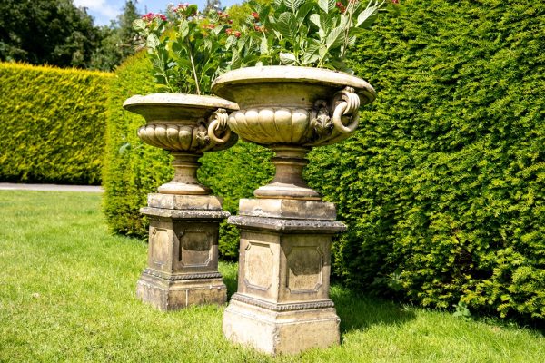 antique garden urns with plinths