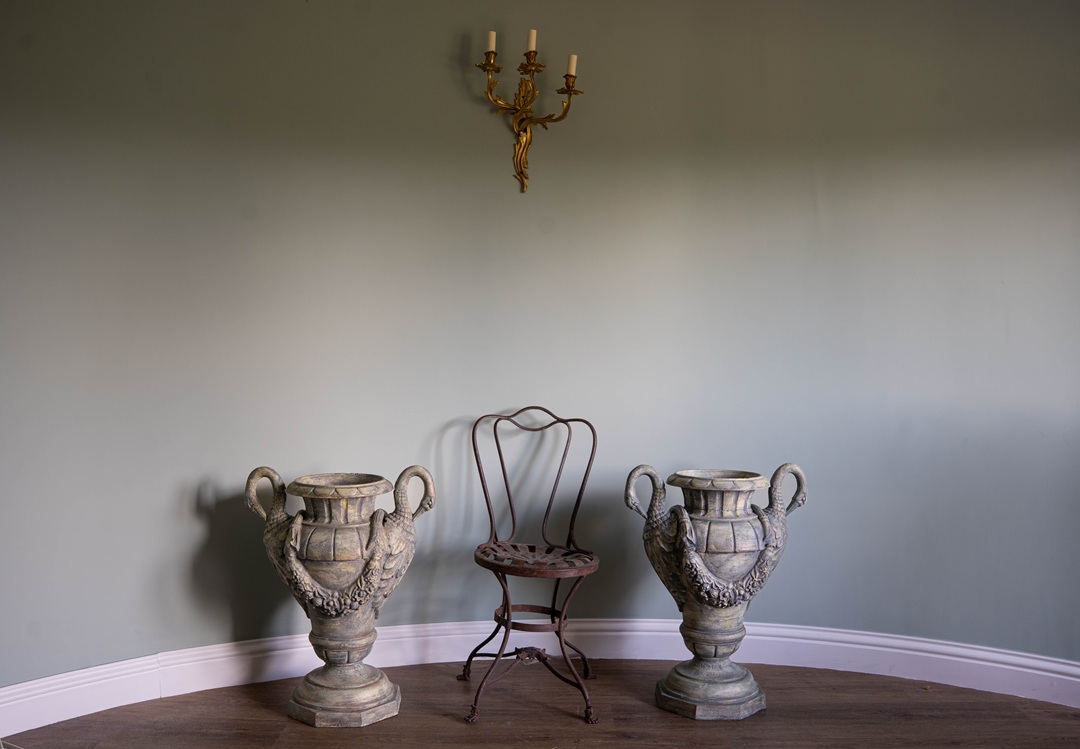 a pair of French urns refurbished