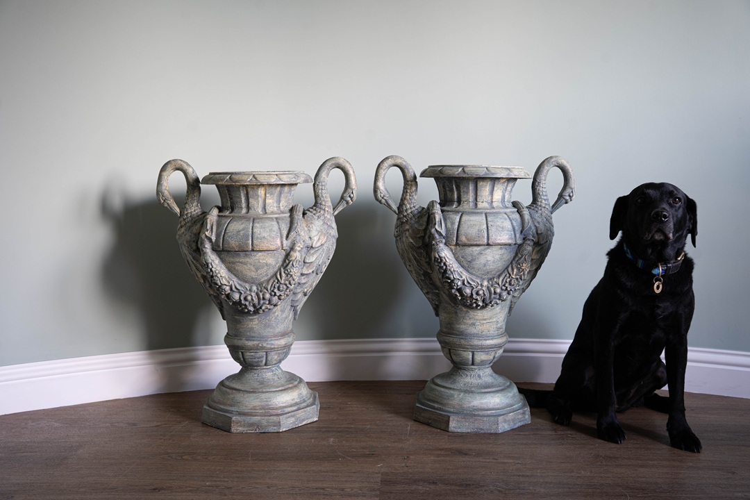 a pair of antique refurbished urns for the home or garden