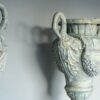 a pair of decorative swan antique urns