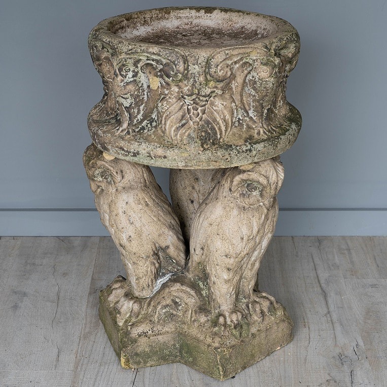 an antique bird bath LEFCO