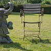 antiques for the garden a bronze statue fountain and a folding chair