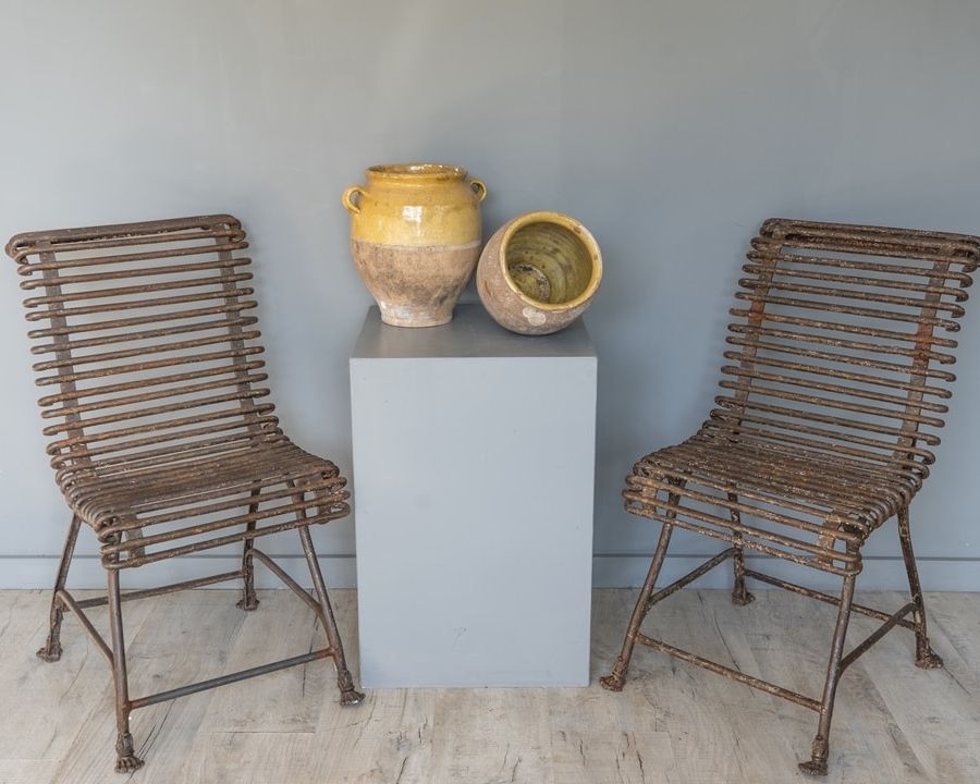French antiques Arras chairs and yellow glazed confit pots