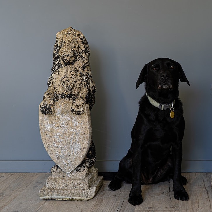 a pair of antique garden lion statues