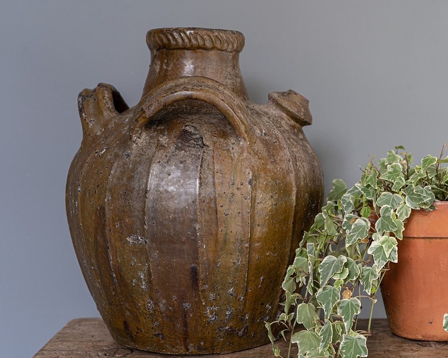 antique decorative walnut oil jug and vase