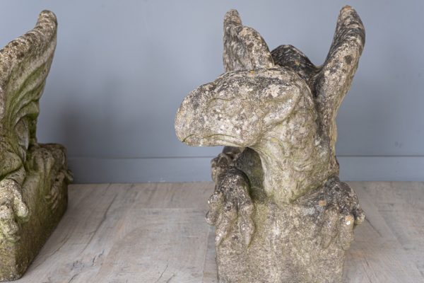 a pair of garden antique statues gargoyles