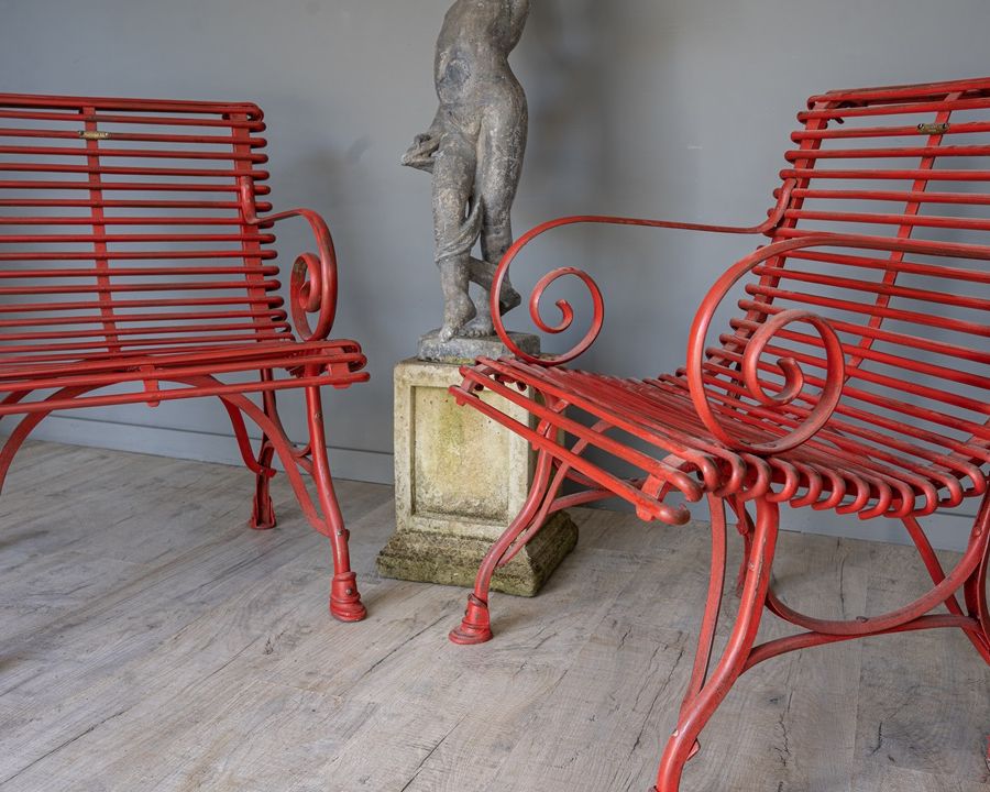 a pair of red garden Arras armchairs from France