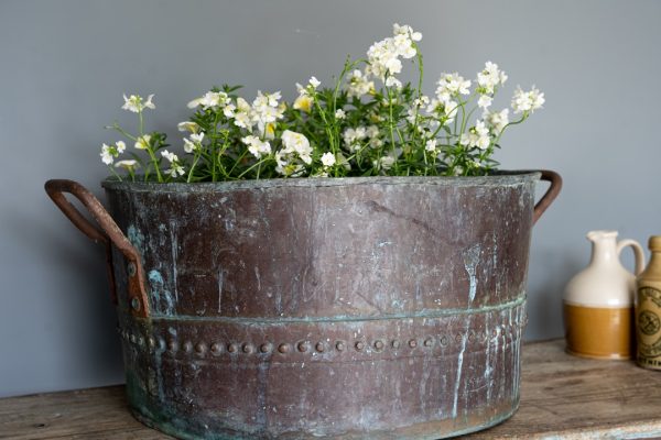 an antique copper cauldron