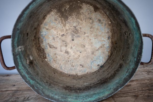 an antique garden copper cauldron
