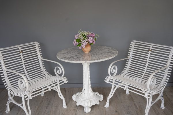 antique interior table with cast iron base and new marble top