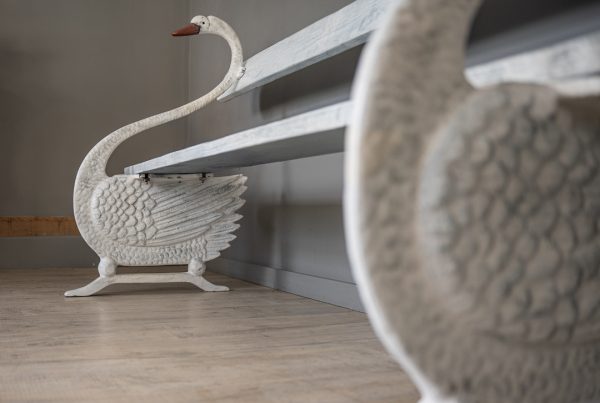 restored antique swan garden bench