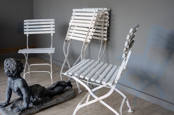 a set of folding garden chairs