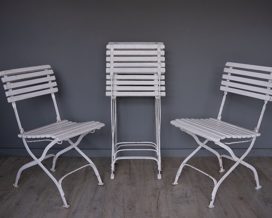 a set of vintage folding garden dining chairs
