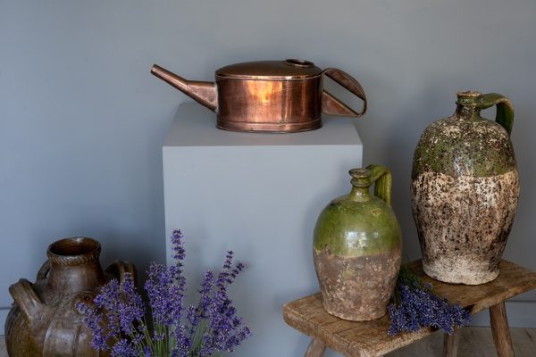 a small antique French watering can for indoor use