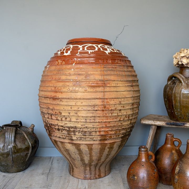 an antique terracotta pot