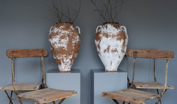 large antique style white coated terracotta vases
