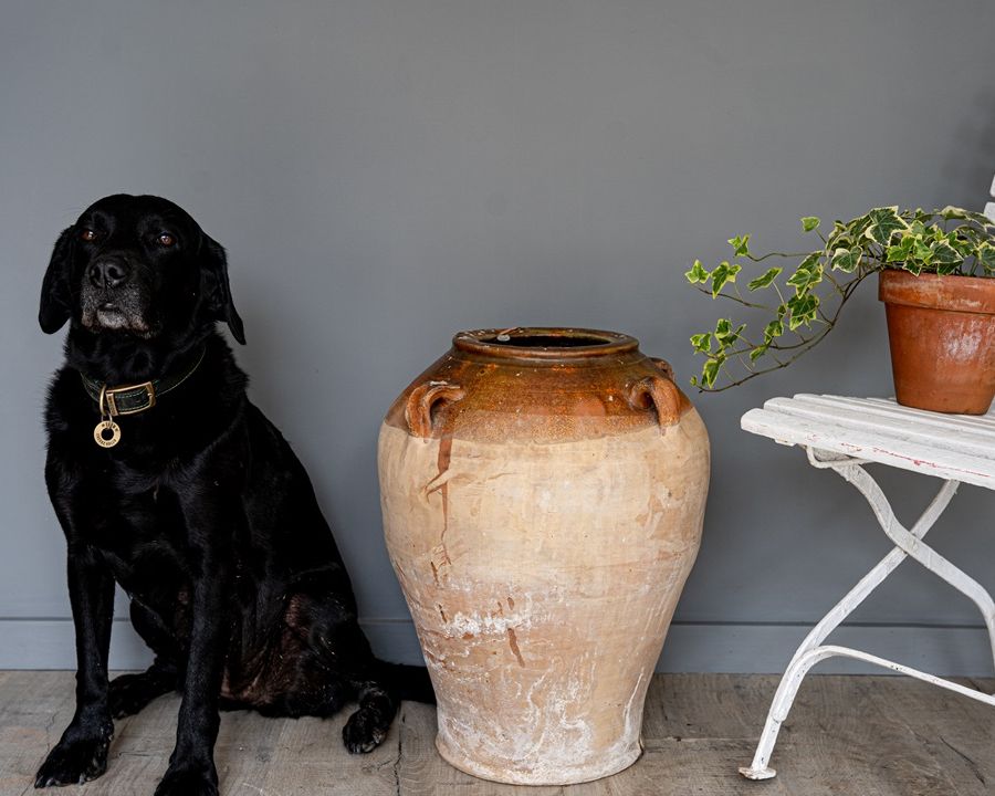 a decorative antique brown part glazed terracotta pot or vase from Spain