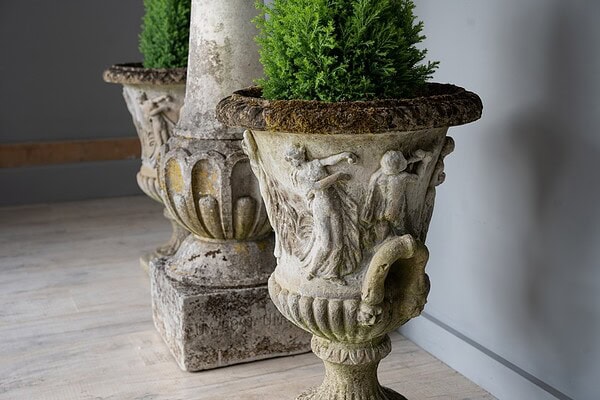 antique pair of cast stone garden urns