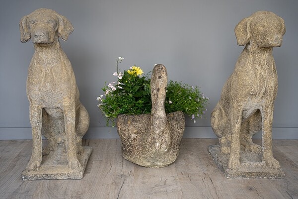 pair of cast stone garden hound dog statues