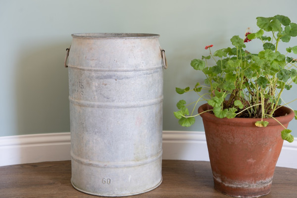 an antique galvanised dolly tub