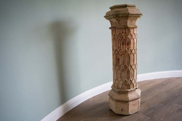 decorative garden pot as a chimney pot