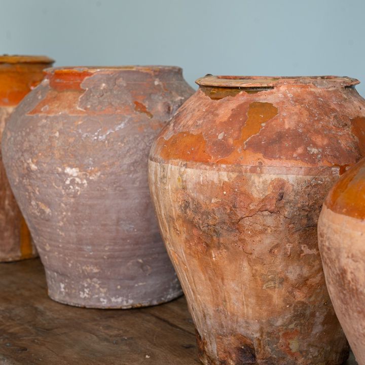 interior styling with brown antique pots and vases