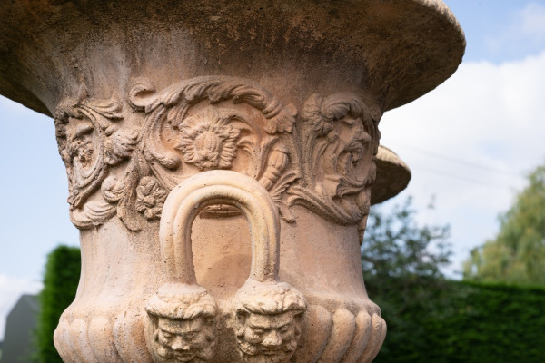 a pair of garden planter urns