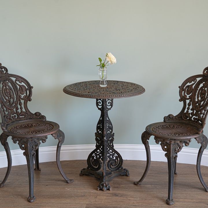 antique Coalbrookdale style garden table and chairs