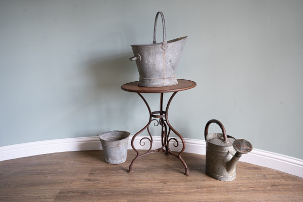 galvanised pots and watering can