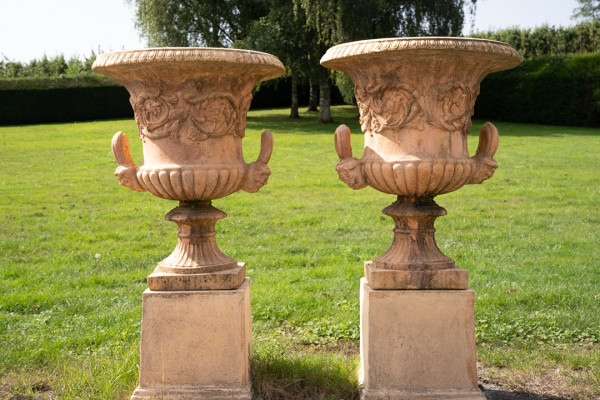 pair of garden urns on plinths for sale