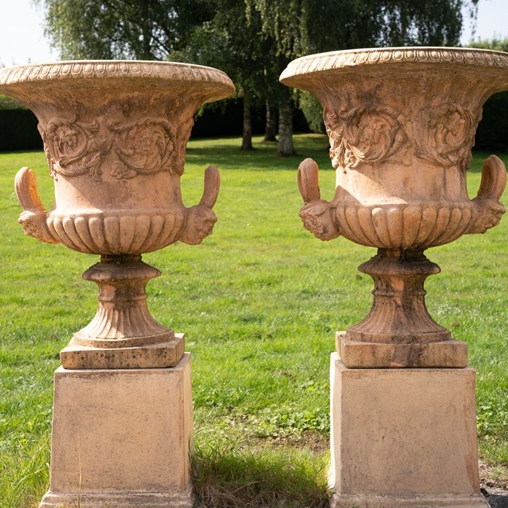 pair of garden urns on plinths for sale