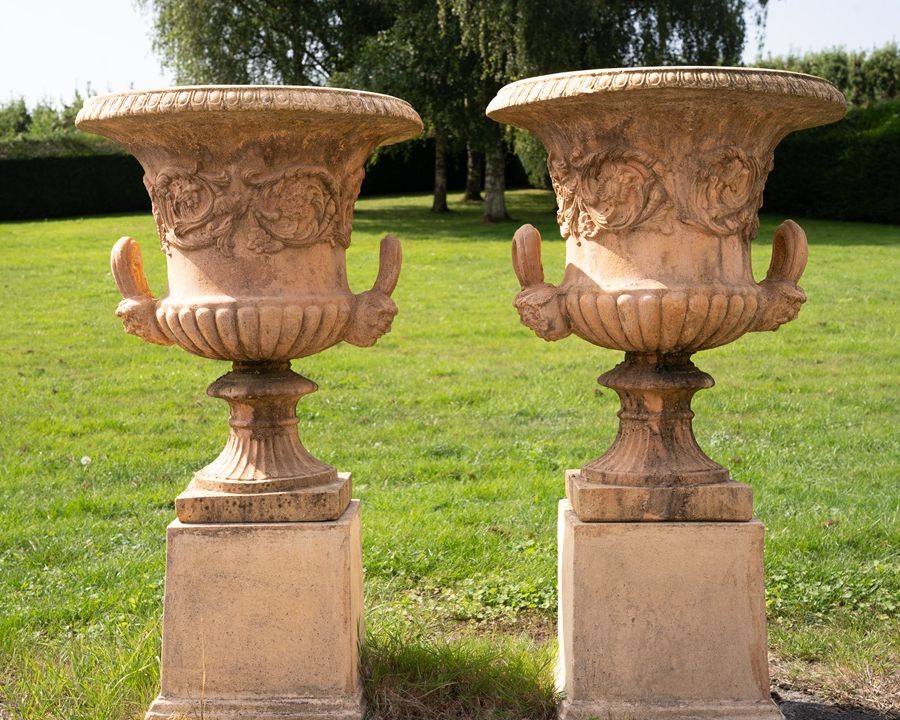 pair of garden urns on plinths for sale