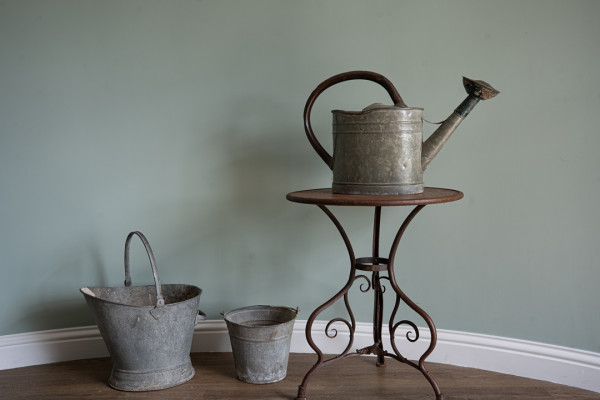 set of vintage watering can and galvanised pots