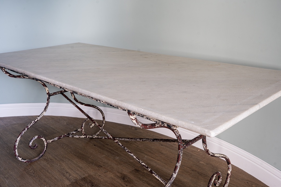 a large antique dining table