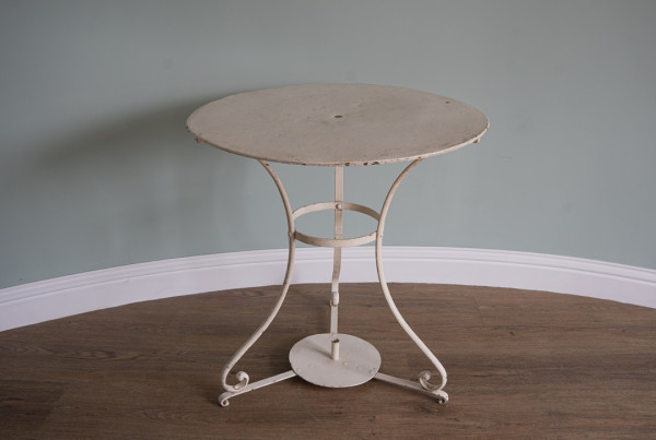 a small white bistro table