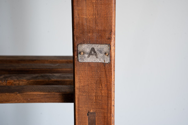 an antique shelving bakers rack