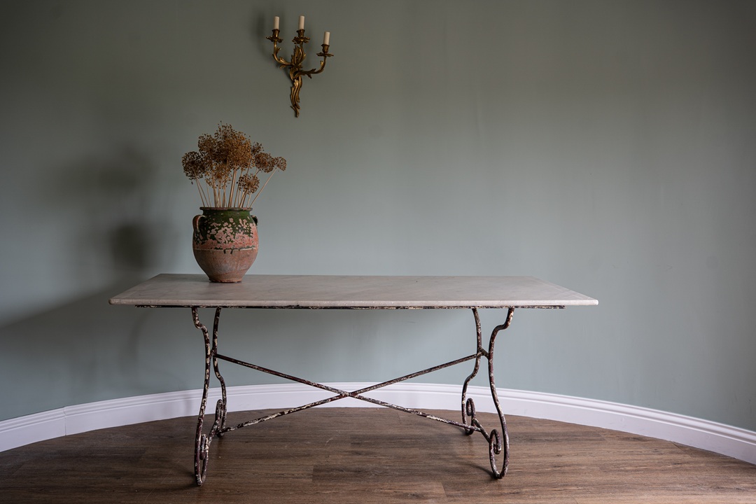 an iron base marble topped antique garden dining table