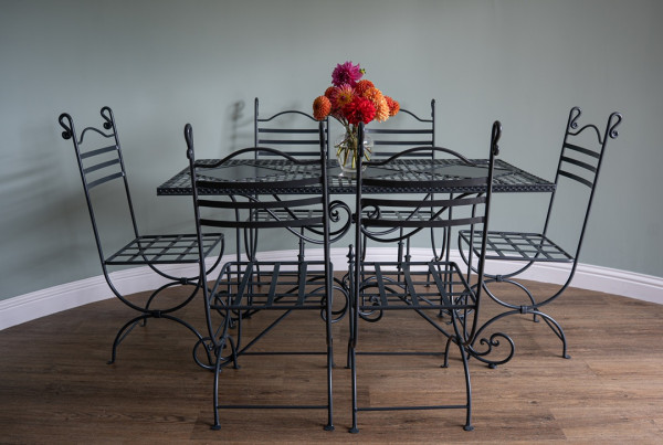 an iron garden table and chair set fully restored
