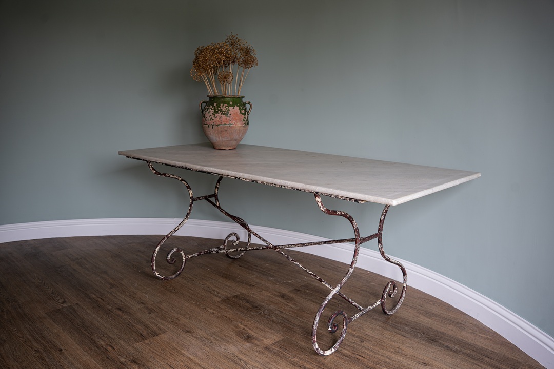 iron legged marble topped antique table