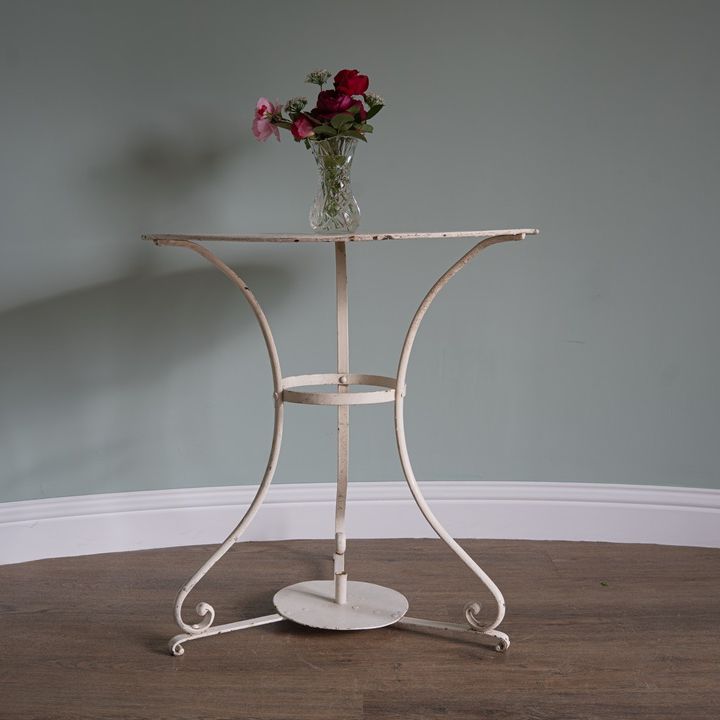 three legged vintage garden dining table for two persons
