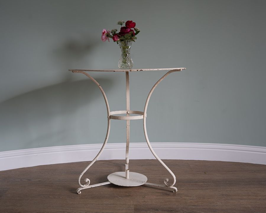 three legged vintage garden dining table for two persons